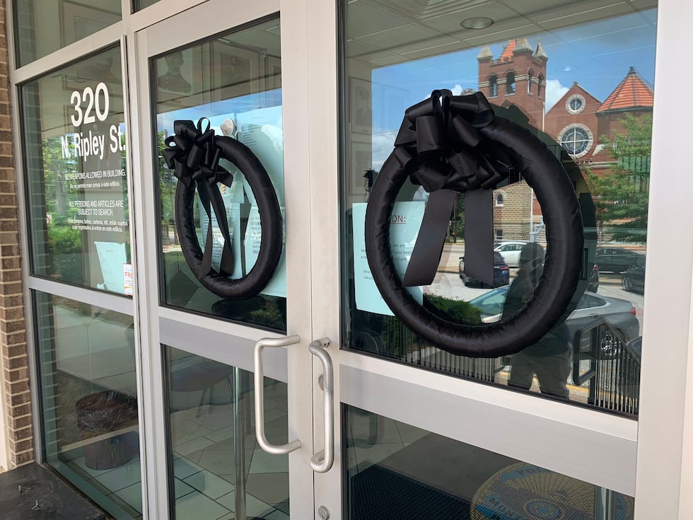 Black wreaths displayed at the entrance to MPD headquarters as officers mourn the loss of Det....