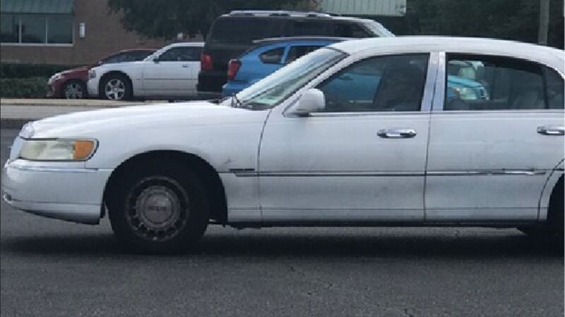 Investigators are trying to locate the white, four-door car and its owner, which they believe...
