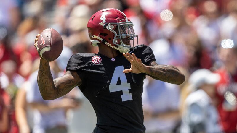 Alabama quarterback Jalen Milroe (4) warms up before Alabama's A-Day NCAA college football...