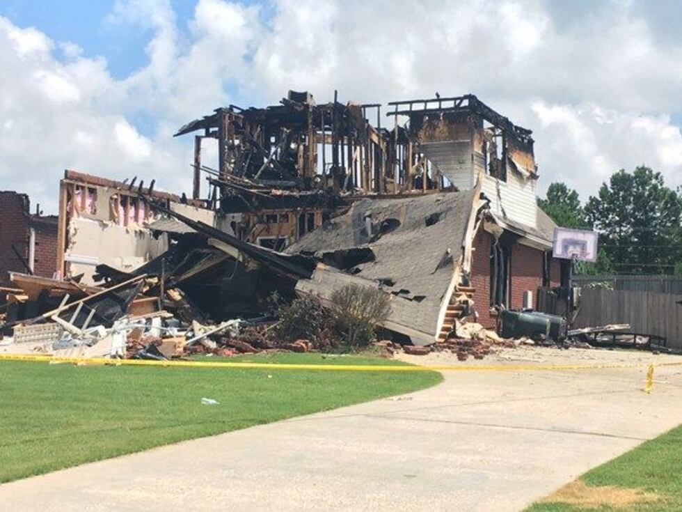 Photos show the burned out Orsi home, set on fire after Bob Orsi killed his wife and one child...