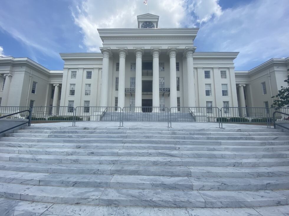 Metal barricades now line the Alabama State Capitol complex.