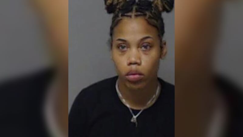 Kealin Lewis, 26, has been charged with second-degree cruelty to children.