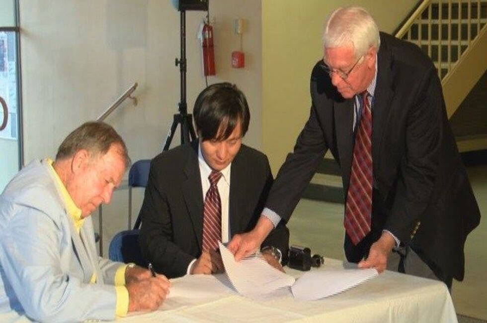 Korens Inc. President signing official paperwork with local officials (Source: WSFA 12 News)