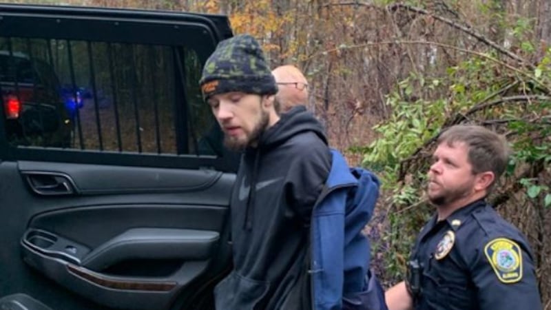 Double murder suspect Ashley Paul Kenney was taken into custody Friday after a manhunt that...