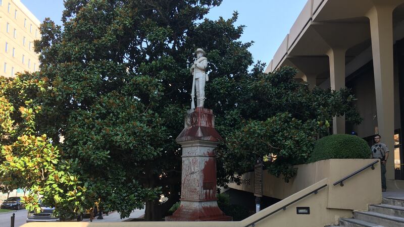 Madison County's Confederate monument was splattered with dark red paint Wednesday morning