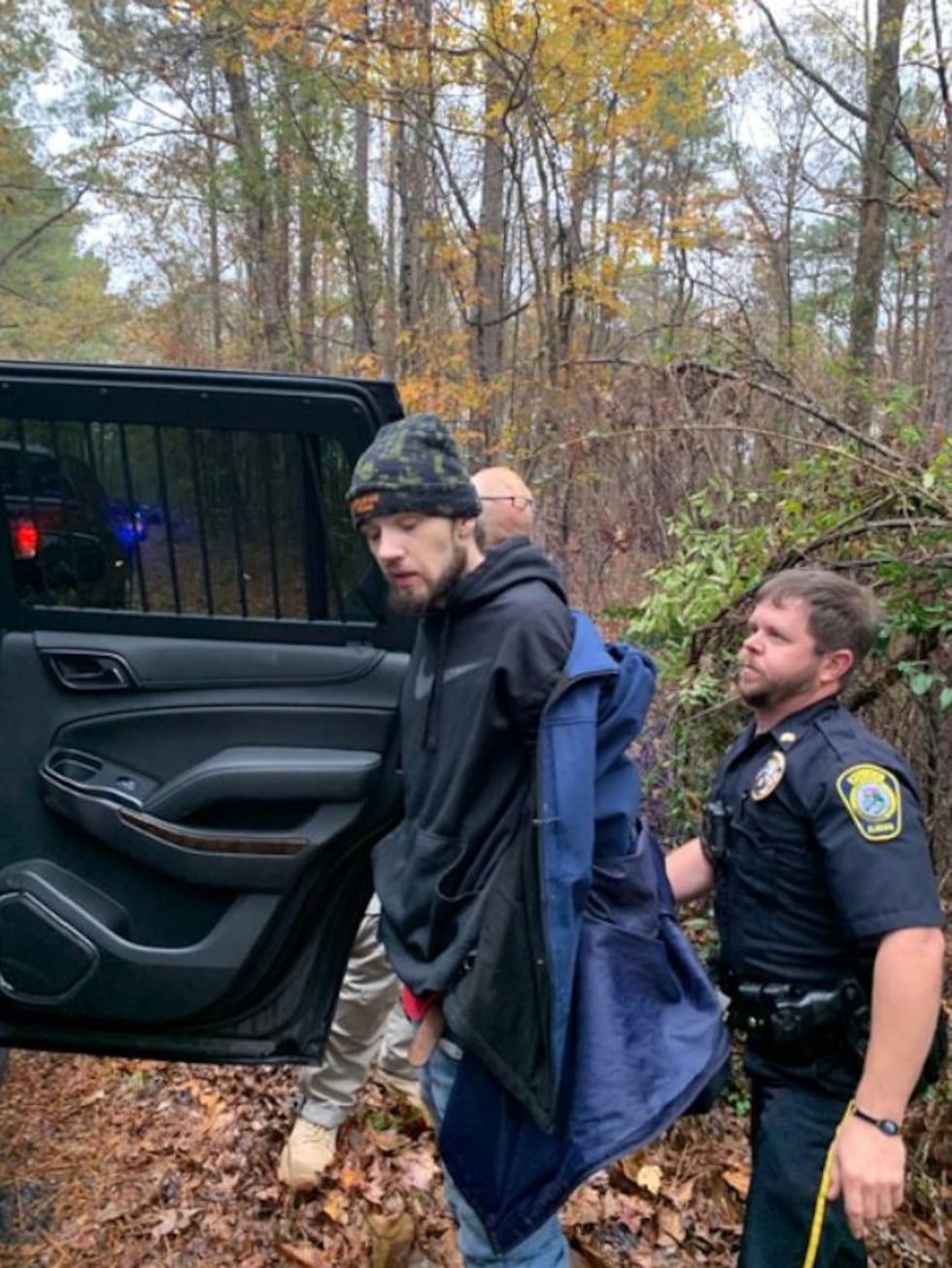 Double murder suspect Ashley Paul Kenney was taken into custody Friday after a manhunt that...