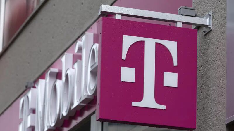 FILE - The T-Mobile logo is seen on a storefront, on Oct. 14, 2022, in Boston. Customers of...