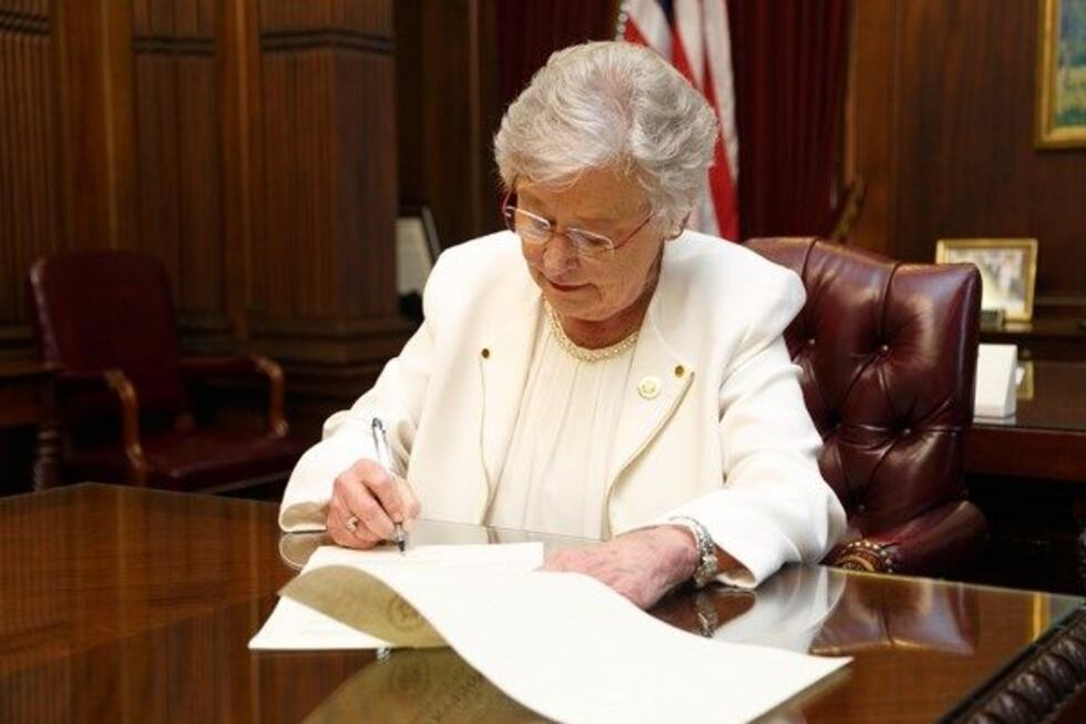 Gov. Ivey signs a State of Emergency declaration. (Source: Governor’s Office, Sydney Foster)