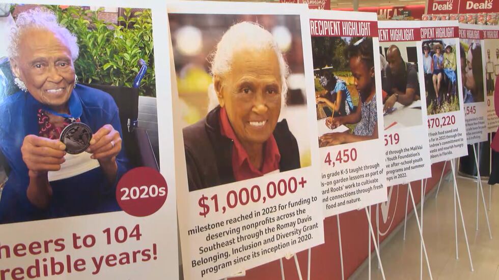 Signs inside the Montgomery Winn-Dixie where Ms. Romay Davis has worked since 2001, show a...