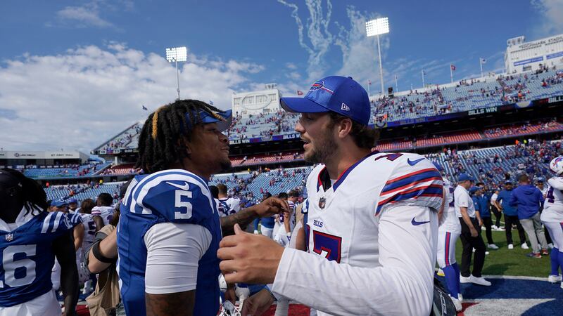 Indianapolis Colts quarterback Anthony Richardson (5) greets Buffalo Bills quarterback Josh...