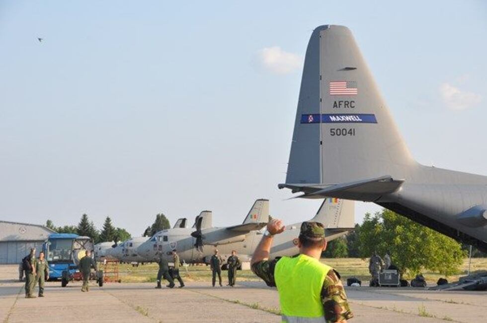 view of the aircraft parking ramp shortly after two 908th Airlift Wing C-130s landed at...
