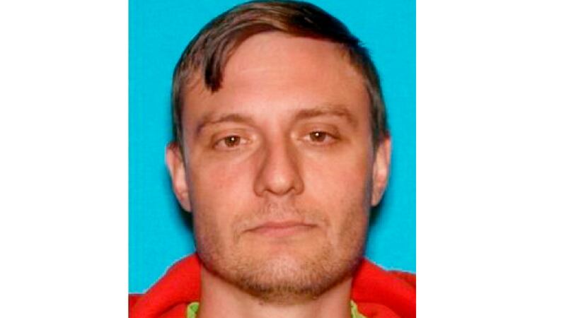 This undated Department of Motor Vehicles photo provided by the FBI shows Robert Alvin Justus...