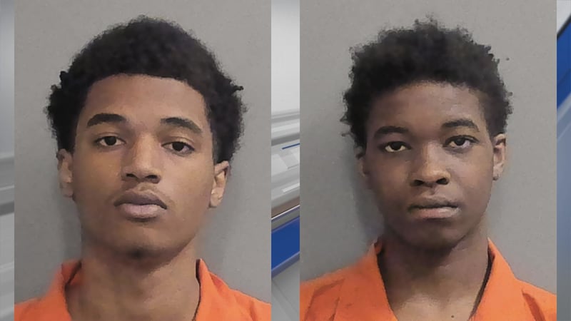 From the left, Marquet Caldwell and Michael Lamar Jr. are two of three suspects charged in a...