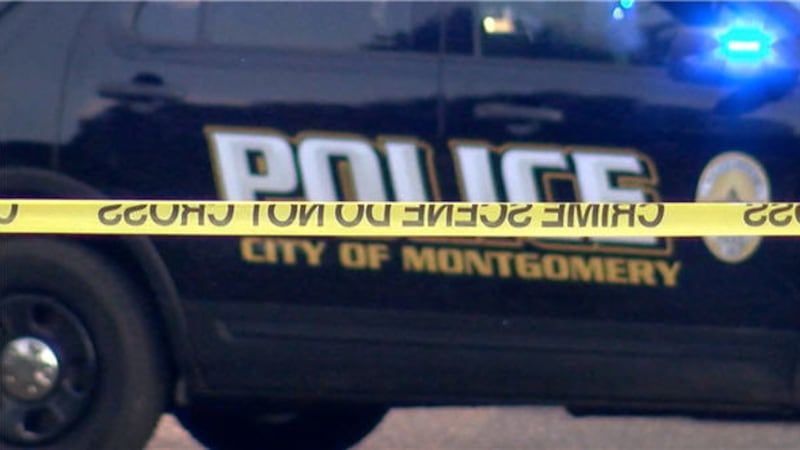 Montgomery Police Car with crime tape file photo