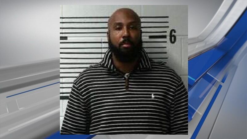 An Elmore County Public Schools employee has been let go months after he was arrested.