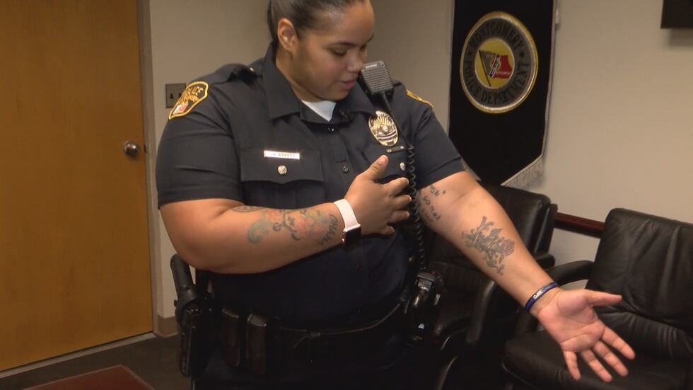 Officer Agosto said her tattoos are for her family members.