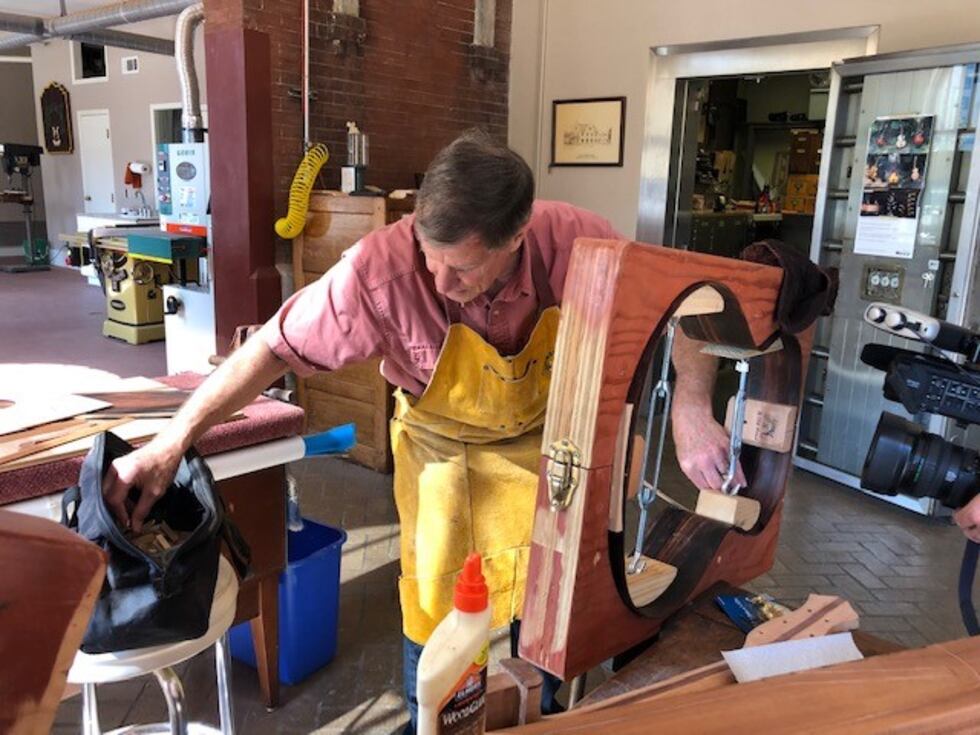Montgomery resident Hank Teuton uses his Baruch Guitar making business to teach people a whole...