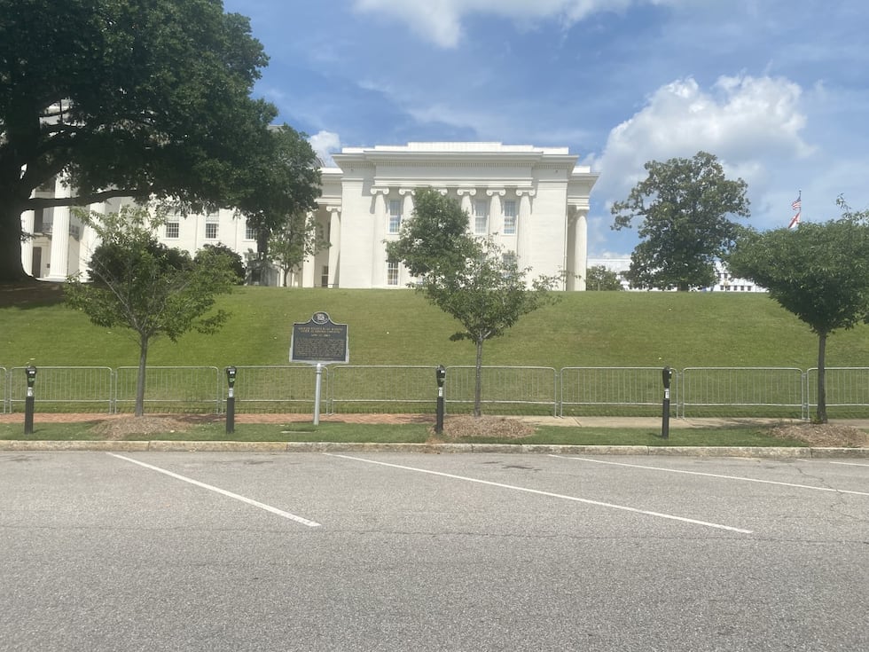Metal barricades now line the Alabama State Capitol complex.