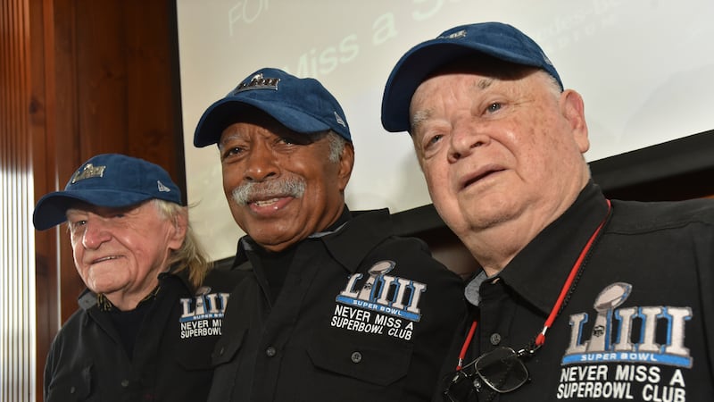 FILE — Members of the Never Miss a Super Bowl Club, from the left, Tom Henschel, Gregory...