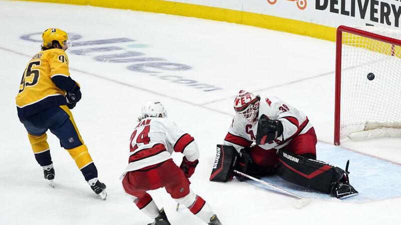 Nashville Predators center Matt Duchene (95) scores the winning goal against Carolina...