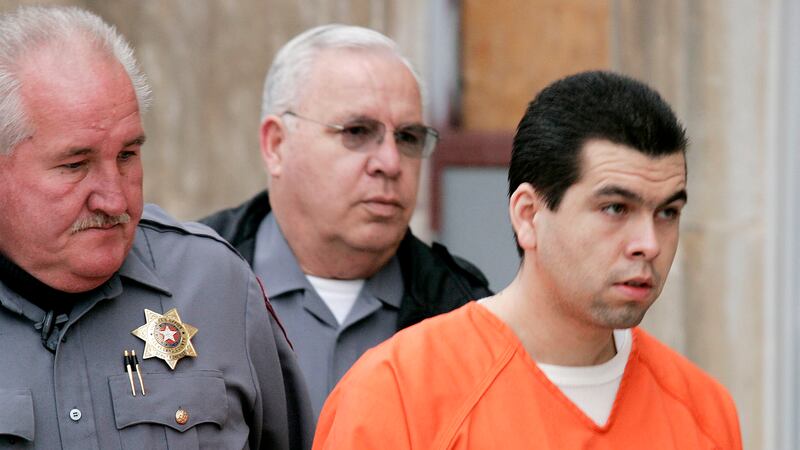 FILE - Anthony Sanchez, right, is escorted into a Cleveland County courtroom for a preliminary...