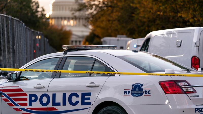 FILE - Washington Metropolitan Police investigate near the Supreme Court and U.S. Capitol in...
